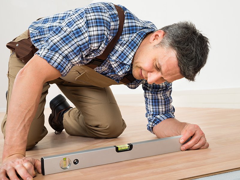 men installing hardwood floor from Stoller Floors in Orrville, OH